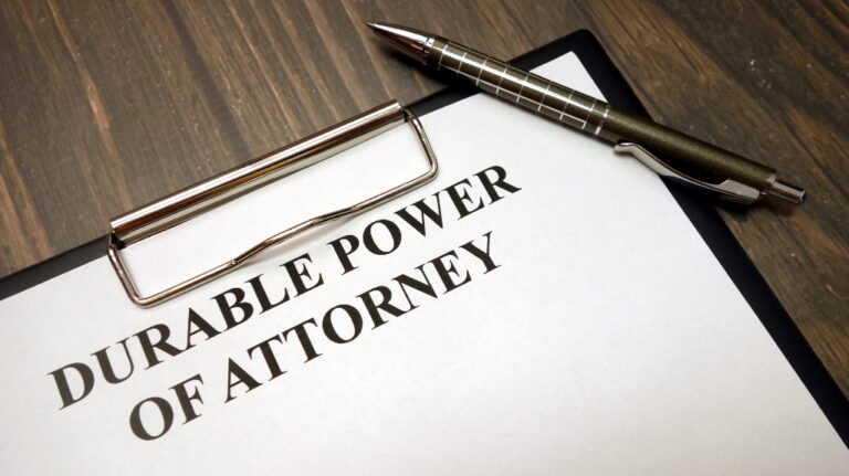Clipboard with durable power of attorney words and pen